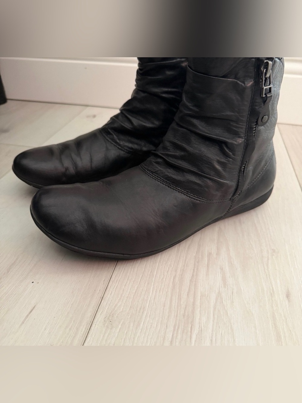 Josef Seibel Naly 24 black ankle boots. Dual side zip. Leather with rubber sole